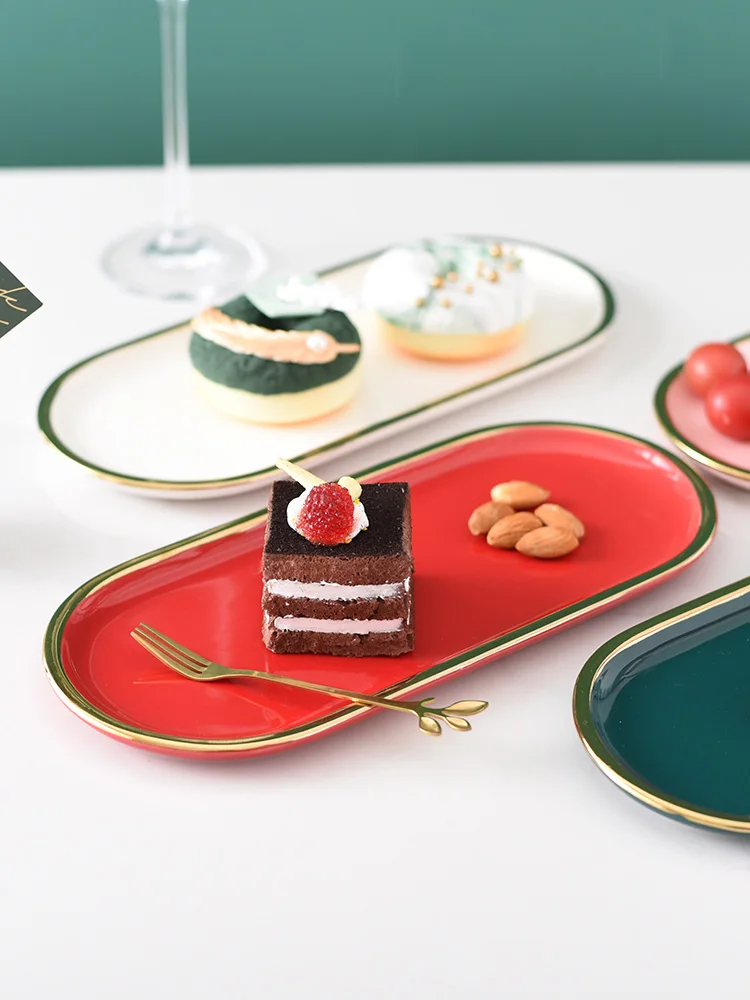 Nordic Oval Ceramic Gold Inlay Cosmetics Jewelry Storage Tray Cake Candy Nut Dessert Dishes Home Decoration Plate Dinner Plates
Nordic Oval Ceramic Gold Inlay Cosmetics Jewelry Storage Tray Cake Candy Nut Dessert Dishes Home Decoration Plate Dinner Plates