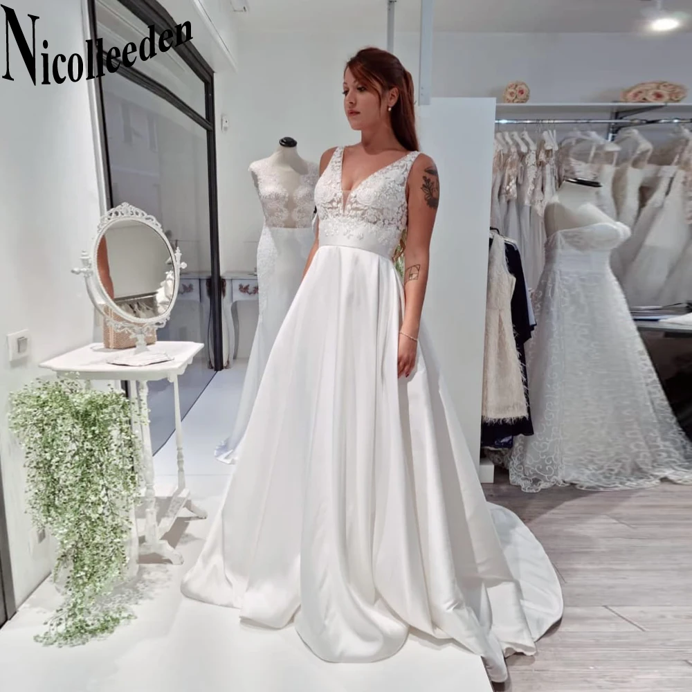 Nicolle Classic Backless V-Neck Wedding Dresses For Women Appliques Satin Tank Sleeveless Court Train A-LINE Custom Made
Nicolle Classic Backless V-Neck Wedding Dresses For Women Appliques Satin Tank Sleeveless Court Train A-LINE Custom Made