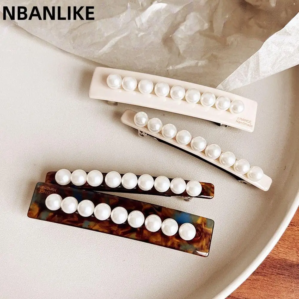 Spring Clip Side Clip Geometry Shape Acetic Acid Hairpin Female Hair Accessories Pearl Hair Clip Korean Style Headwear
Spring Clip Side Clip Geometry Shape Acetic Acid Hairpin Female Hair Accessories Pearl Hair Clip Korean Style Headwear