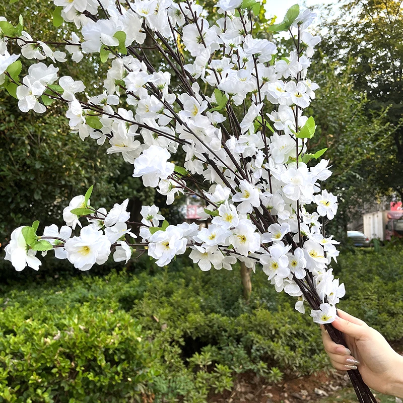 125cm Artificial Flowers Silk Plum Peach Blossom Branch Spring Cherry Flower Tree For Wedding Home Vase Table Decor Party Supply
125cm Artificial Flowers Silk Plum Peach Blossom Branch Spring Cherry Flower Tree For Wedding Home Vase Table Decor Party Supply
