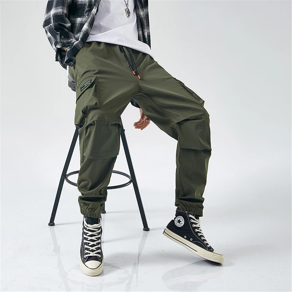 2022 New Joggers Cargo Pants for Men Casual Hip Hop Pocket Male Trousers Sweatpants Streetwear Ribbons Techwear Pants
2022 New Joggers Cargo Pants for Men Casual Hip Hop Pocket Male Trousers Sweatpants Streetwear Ribbons Techwear Pants