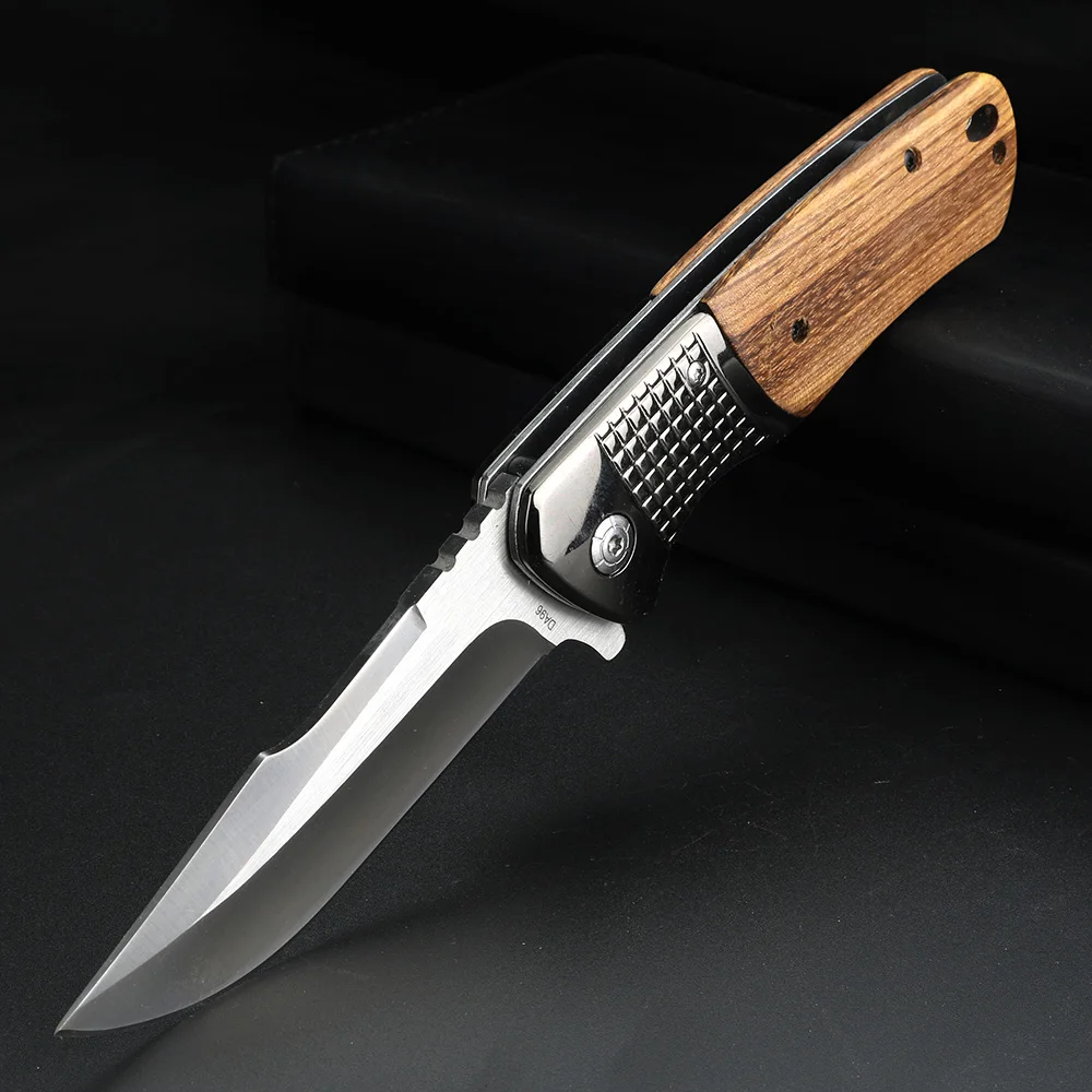 Outdoor multi-functional folding knife with wooden handle Camping EDC tool knife High hardness hunting knife
Outdoor multi-functional folding knife with wooden handle Camping EDC tool knife High hardness hunting knife