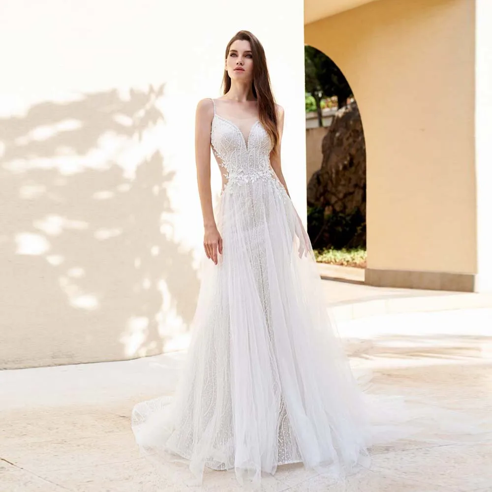 Sexy Wedding Dresses Deep V-Neck Spaghetti Straps 2022 New Bridal Gown Illusion Back Button Lace Appliques Beaded Bride Dress
Sexy Wedding Dresses Deep V-Neck Spaghetti Straps 2022 New Bridal Gown Illusion Back Button Lace Appliques Beaded Bride Dress