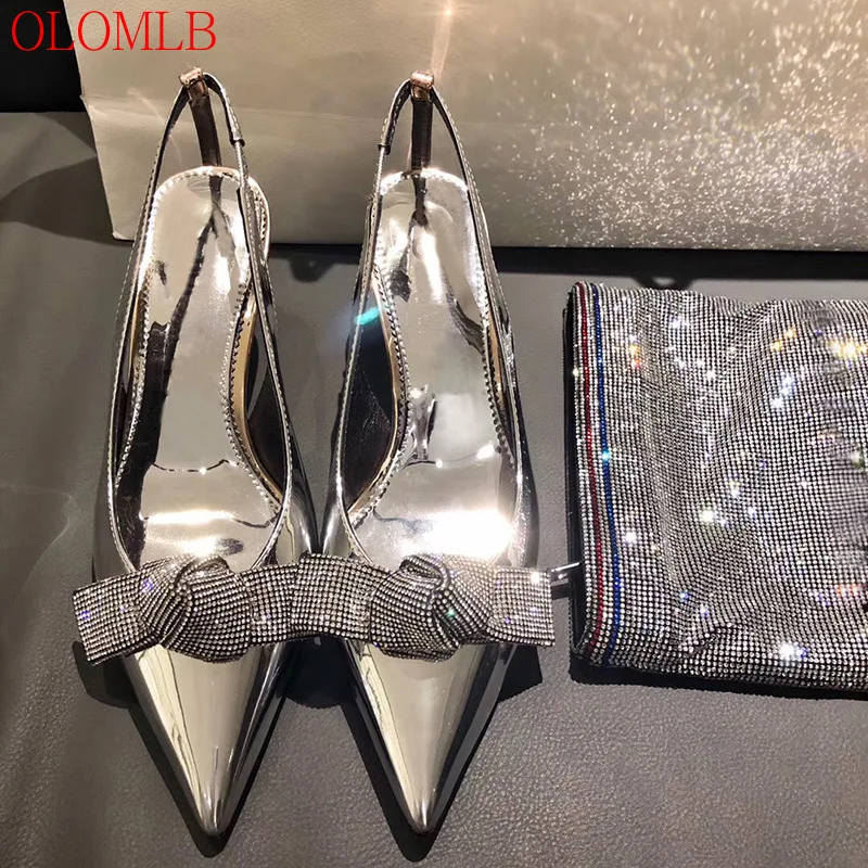 OLOMLB High Heel Pointed Toe Fashion Women Shoes 2022 New Metal Rhinestone Bow Back Empty Slippers Women Baotou Stiletto Sandals
OLOMLB High Heel Pointed Toe Fashion Women Shoes 2022 New Metal Rhinestone Bow Back Empty Slippers Women Baotou Stiletto Sandals