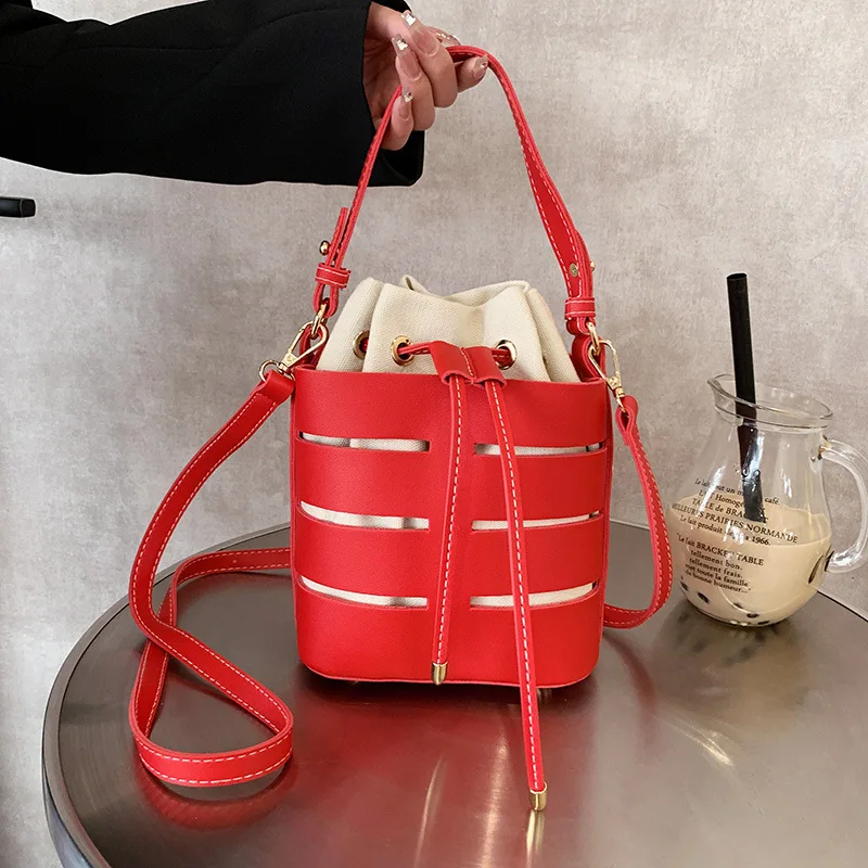 Handbag Fashion Women's Bag Hollow Bucket Shape Single Shoulder Messenger Bag Drawstring Inner Pocket Bags for Women
Handbag Fashion Women's Bag Hollow Bucket Shape Single Shoulder Messenger Bag Drawstring Inner Pocket Bags for Women