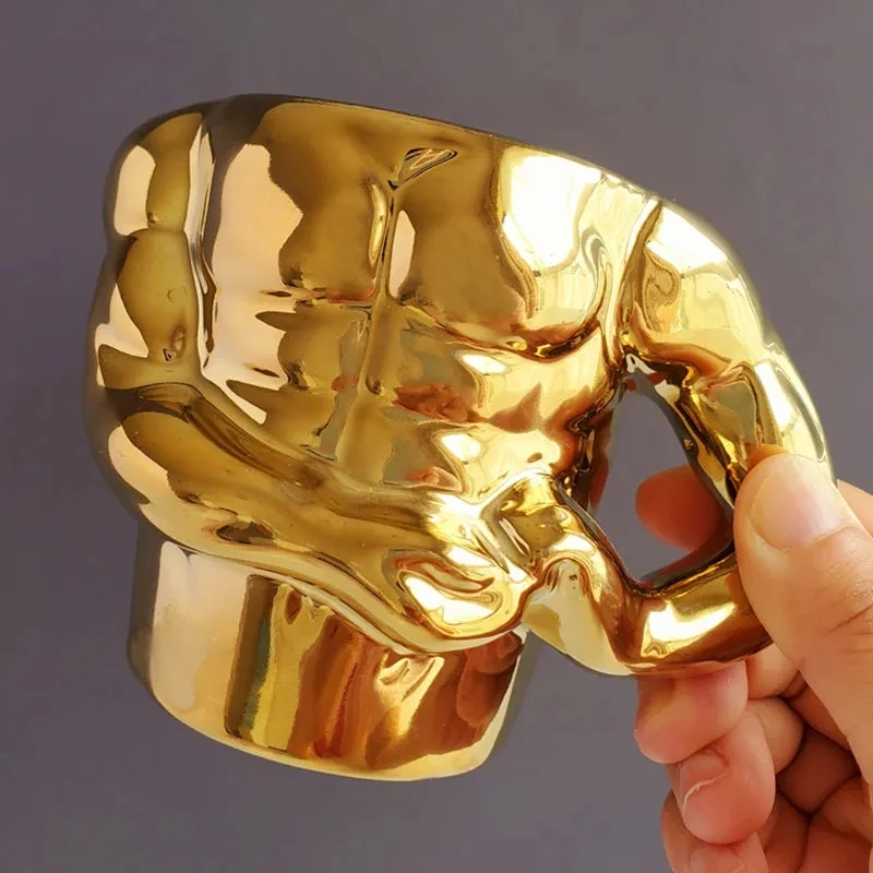 300ML Creative Gold Muscle Man Mug Ceramic Coffee Cup Ceramic Mug with spoon Creative Personality Funny Water Cup Birthday Gift
300ML Creative Gold Muscle Man Mug Ceramic Coffee Cup Ceramic Mug with spoon Creative Personality Funny Water Cup Birthday Gift