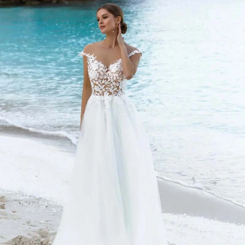 New Lace Appliques Cap Sleeve Tulle Wedding Dress A-Line Draped Lace Bridal Gown For Women Sweep Train Summer Dresses Bohemian
New Lace Appliques Cap Sleeve Tulle Wedding Dress A-Line Draped Lace Bridal Gown For Women Sweep Train Summer Dresses Bohemian