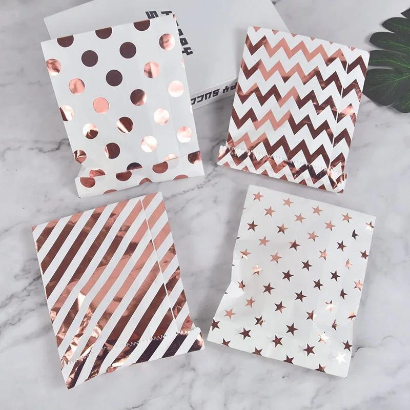 25pcs/lot Rose Gold Treat Candy Bag Wedding Party Favors Polka Dot Star Stripe Printed Paper Bags Kids Birthday Gift Bag Packing
25pcs/lot Rose Gold Treat Candy Bag Wedding Party Favors Polka Dot Star Stripe Printed Paper Bags Kids Birthday Gift Bag Packing