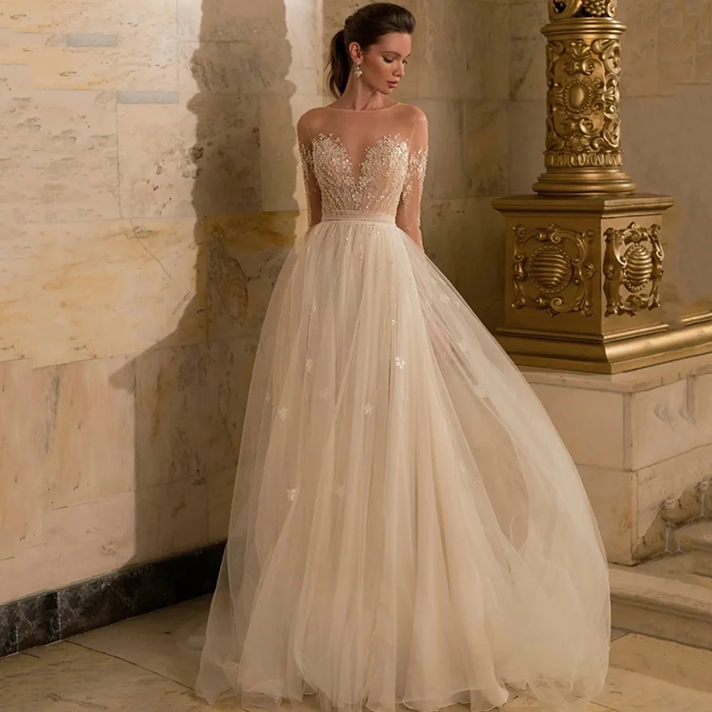 Sparkly Bohemia Wedding Dresses V-Neck Long Sleeves Tulle Dress Illusion Back Button Beading Appliques Bridal Gown Vestido Novia
Sparkly Bohemia Wedding Dresses V-Neck Long Sleeves Tulle Dress Illusion Back Button Beading Appliques Bridal Gown Vestido Novia