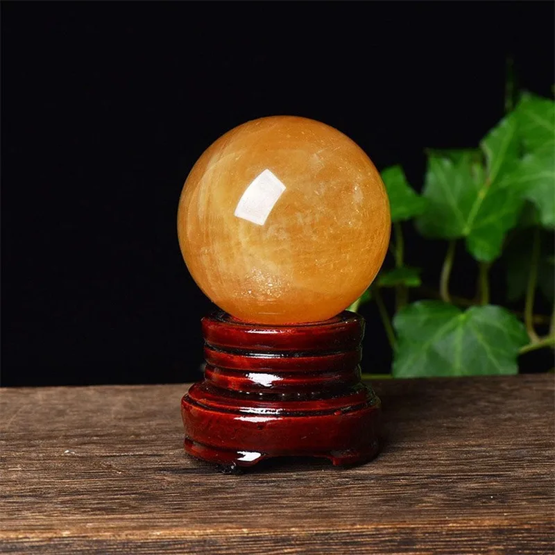 Natural Topaz Ball Decoration Raw Stone Polishing Ice SPAR Balls Calcite Yellow Crystal Decoration Wholesale 
Natural Topaz Ball Decoration Raw Stone Polishing Ice SPAR Balls Calcite Yellow Crystal Decoration Wholesale