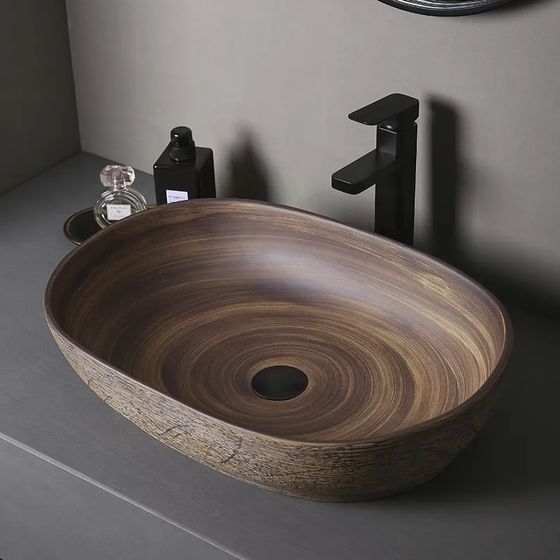 Art Basin Ceramic Sinks CounterTop Wash Basin Vessel Sinks Oval Washing Basin Bathroom Sinks Ceramic Wash Basin with Faucets 
Art Basin Ceramic Sinks CounterTop Wash Basin Vessel Sinks Oval Washing Basin Bathroom Sinks Ceramic Wash Basin with Faucets
