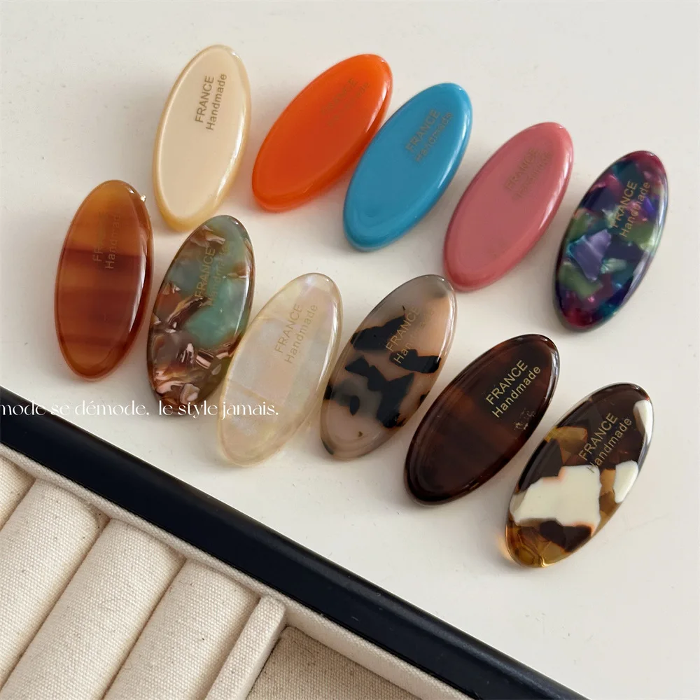 

Woman Mini Solid Color Cute Small Ellipse Acetate Barrettes Trendy Side Hair Claw Girls Hair Accessories Duckbill Clips Hairgrip
