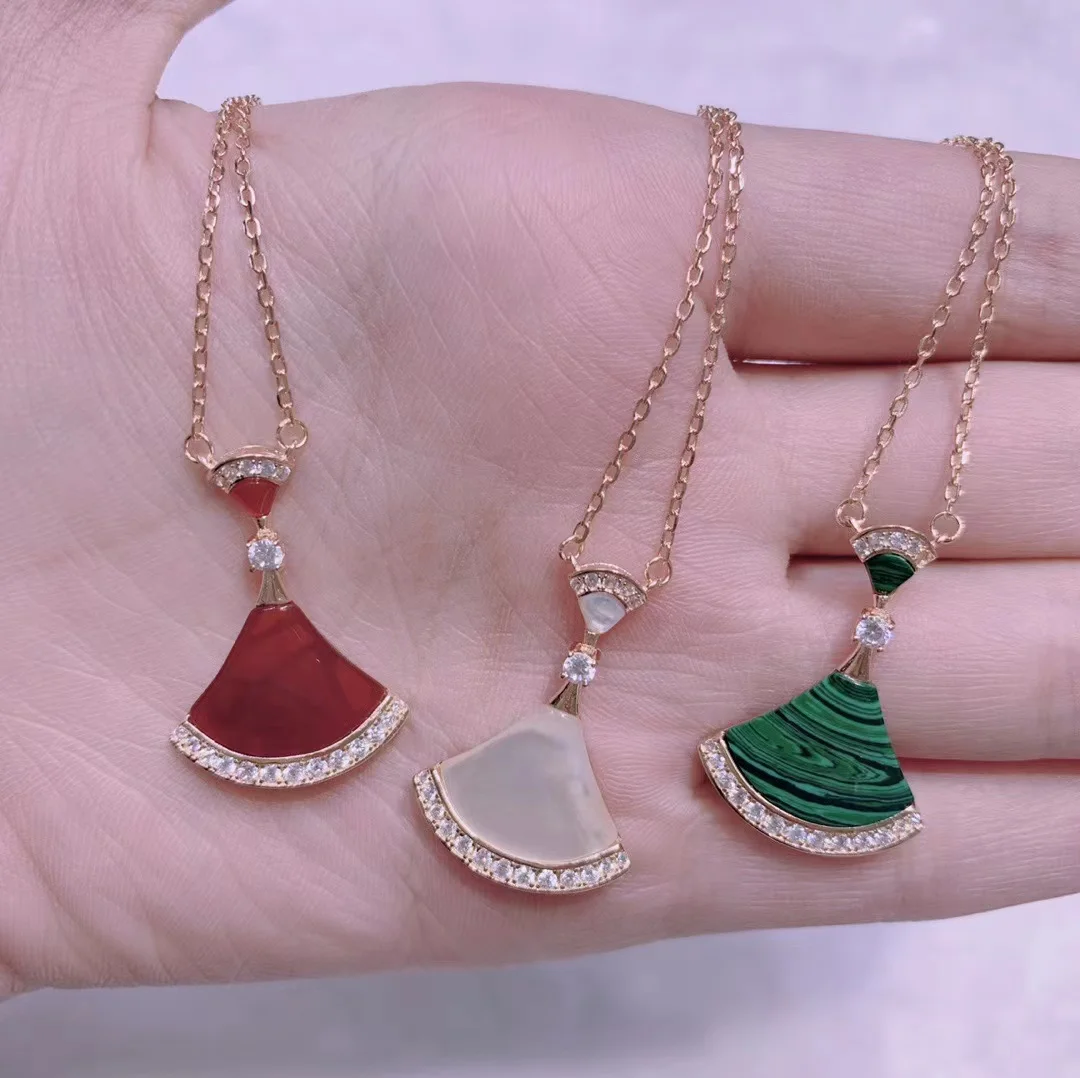 S925 silver small skirt necklace white fritillary green red chalcedony inlaid with diamond fan-shaped necklace hair real jewelry 
S925 silver small skirt necklace white fritillary green red chalcedony inlaid with diamond fan-shaped necklace hair real jewelry
