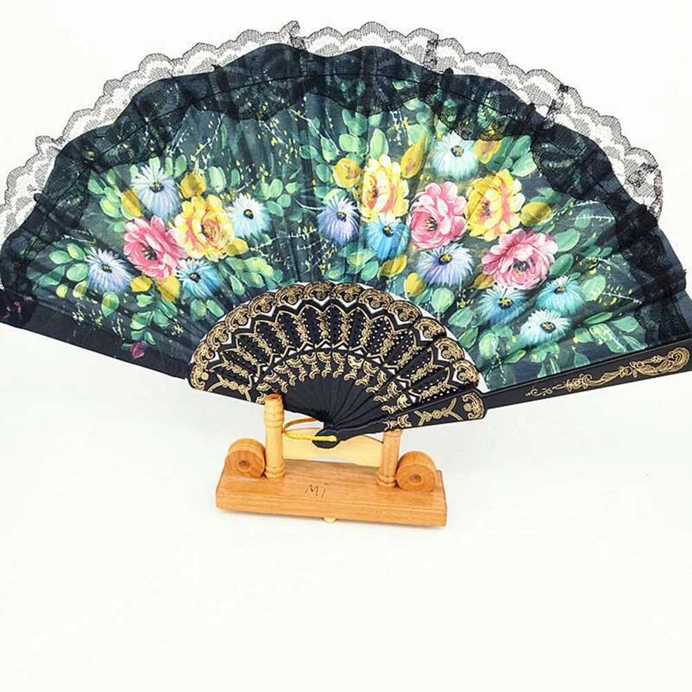 Spanish Handheld Fan Floral Print Fabric Folding Portable Dance Fan Party Weddin Decor Fan Home Decoration Ornaments Craft
Spanish Handheld Fan Floral Print Fabric Folding Portable Dance Fan Party Weddin Decor Fan Home Decoration Ornaments Craft
