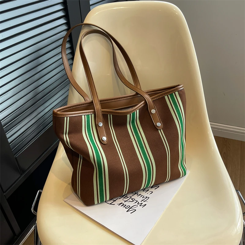 New Trendy Large Capacity Women Shopper Travel Handbag Ins Student Female Shoulder Bag Strip Pattern Ladies Canvas Tote Bag
New Trendy Large Capacity Women Shopper Travel Handbag Ins Student Female Shoulder Bag Strip Pattern Ladies Canvas Tote Bag