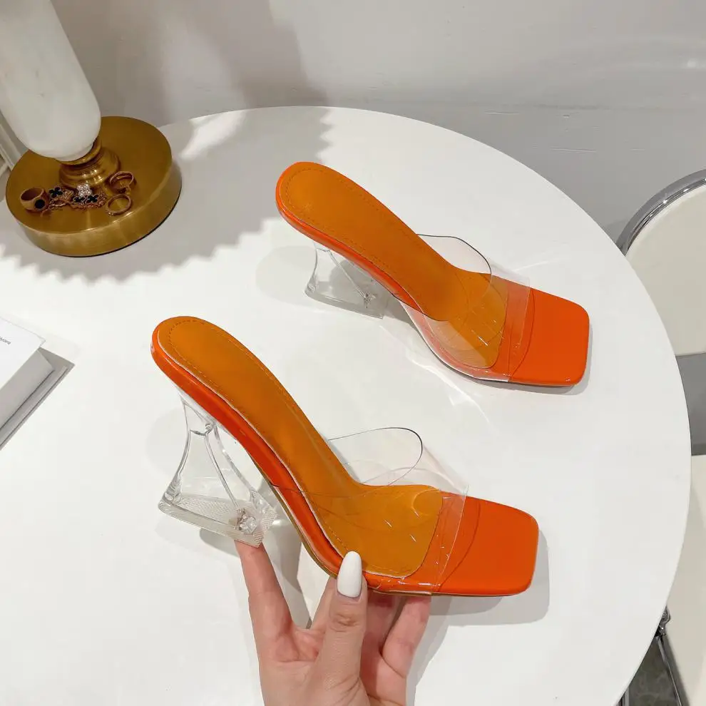 2022 Star style Transparent PVC Crystal Clear Heeled Women Slippers Fashion High heels Female Mules Slides Summer Sandals Shoes 
2022 Star style Transparent PVC Crystal Clear Heeled Women Slippers Fashion High heels Female Mules Slides Summer Sandals Shoes