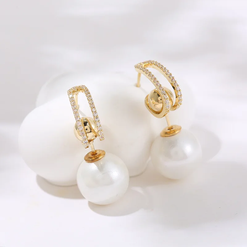 Korean Imitation Pearl Dangle Earrings for Women Rhinestone Fashion Gold Designer Jewelry Stud Wedding Accessories Summer Gifts
Korean Imitation Pearl Dangle Earrings for Women Rhinestone Fashion Gold Designer Jewelry Stud Wedding Accessories Summer Gifts