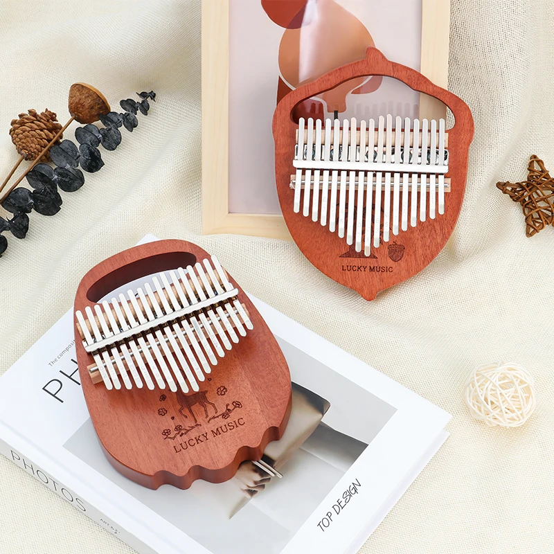 Kalimba 17 клавиш большой палец пианино Okoume деревянный музыкальный инструмент для начинающих Африканский калимба книга для настройки молоток Пальчиковое пианино
Kalimba 17 клавиш большой палец пианино Okoume деревянный музыкальный инструмент для начинающих Африканский калимба книга для настройки молоток Пальчиковое пианино