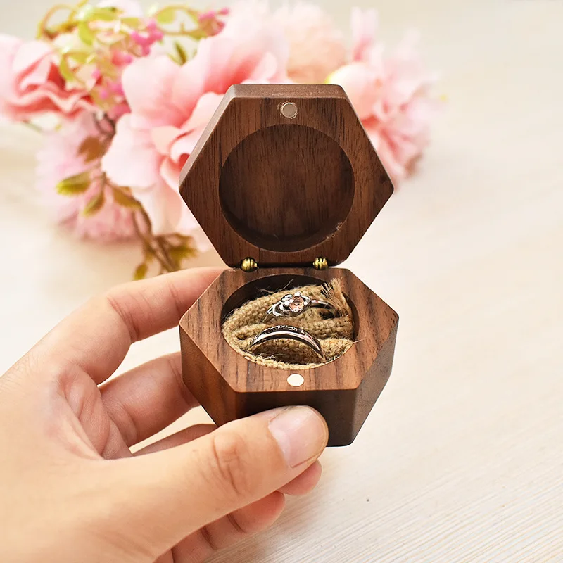 Hexagonal walnut solid wood ring box wedding proposal diamond ring box wedding ceremony single ring box engraved logo
Hexagonal walnut solid wood ring box wedding proposal diamond ring box wedding ceremony single ring box engraved logo
