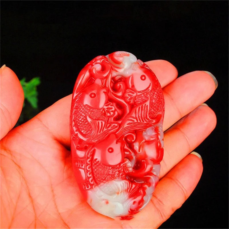 

Xinjiang Hetian Jade, Chicken Blood Jade, Carp, Hand-held Pendant, Men's Style Has More Pendants Every Year.