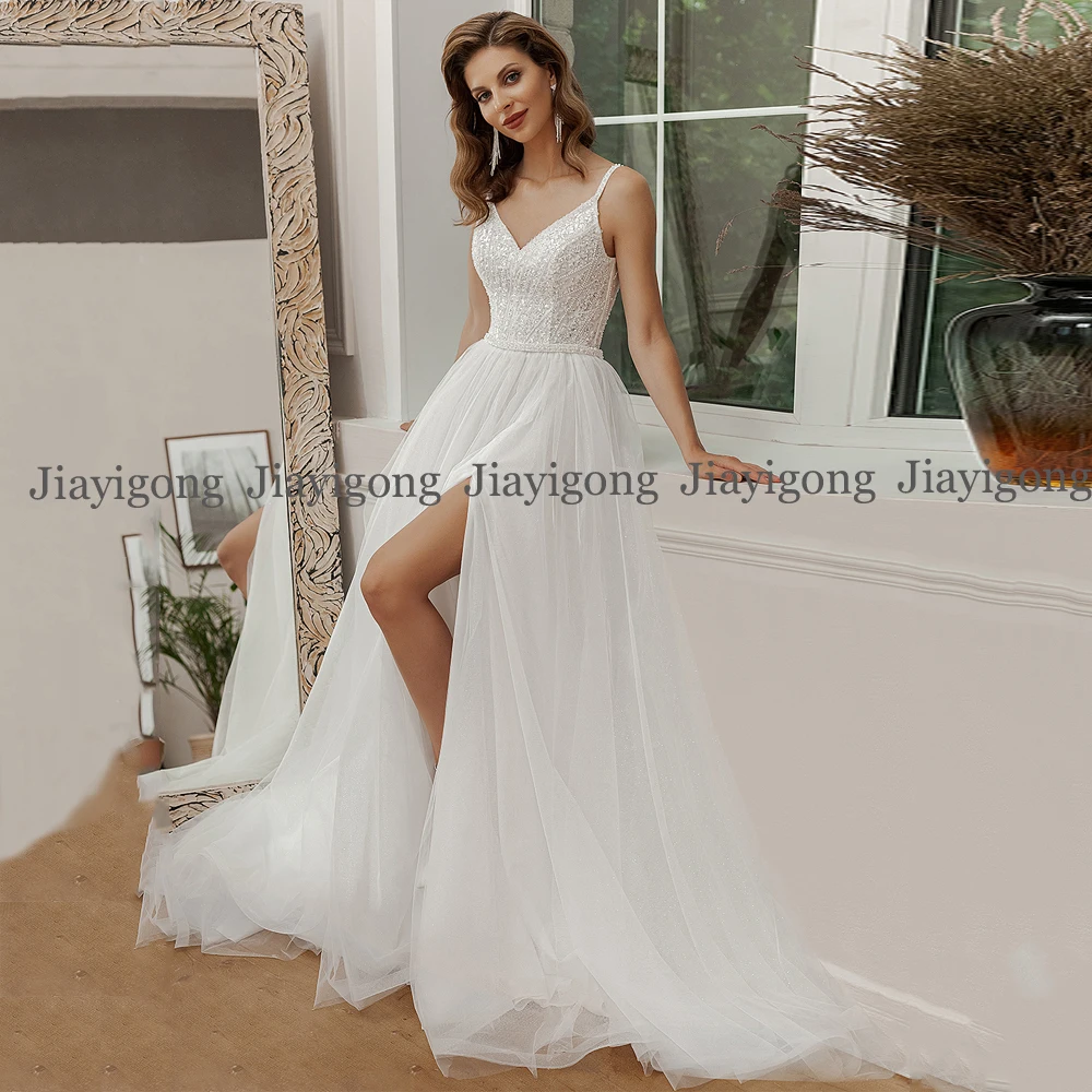 Jiayigong Sexy Wedding Dress Sparkling V Neck Spaghetti Straps Sequin A Line Sweep Train Corset Bridal Gown Vestido Novia 2022
Jiayigong Sexy Wedding Dress Sparkling V Neck Spaghetti Straps Sequin A Line Sweep Train Corset Bridal Gown Vestido Novia 2022