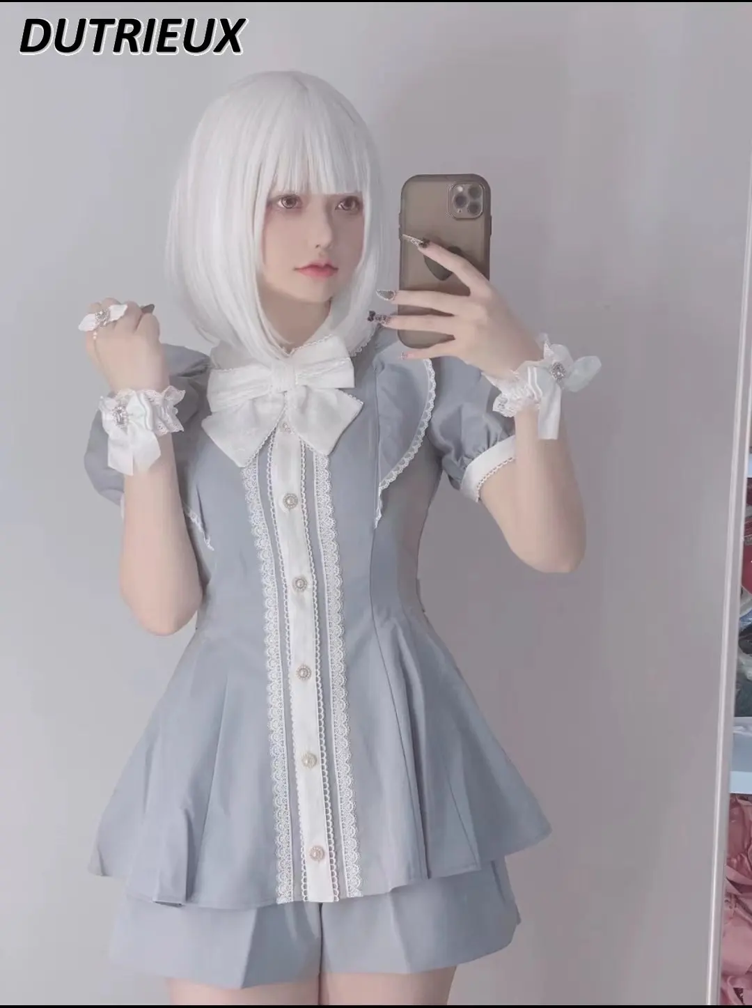 Lace Ruffled Short Sleeves Shirt Lolita Women's 2 Piece Sets Japanese Style Cosplay Slimming Dress Culottes Sweet Shorts Suit
Lace Ruffled Short Sleeves Shirt Lolita Women's 2 Piece Sets Japanese Style Cosplay Slimming Dress Culottes Sweet Shorts Suit