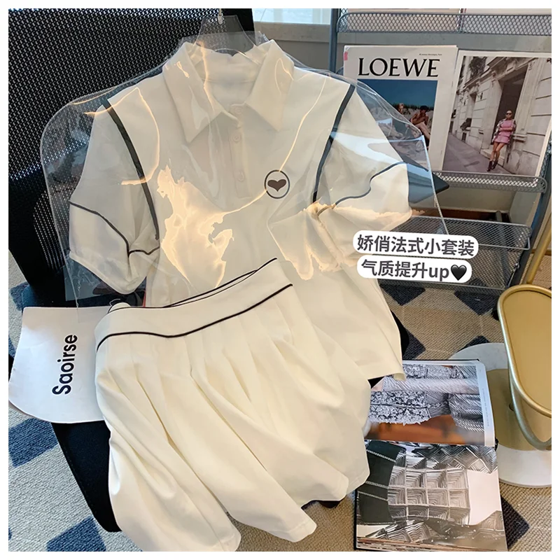 Elegant Casual Polo Collar Suit Female 2022 New Fashion Two-piece Shirt Top + Mini Hip Skirt Two-piece Jogger Sports Short Skirt
Elegant Casual Polo Collar Suit Female 2022 New Fashion Two-piece Shirt Top + Mini Hip Skirt Two-piece Jogger Sports Short Skirt