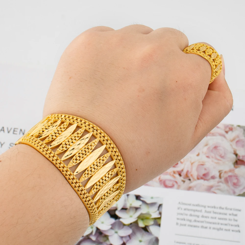 Nigeria Gold Color Bangle Jewelry Set Dubai African Women Bangles and Ring Party Gifts Hand Bangle Jewelry Ethiopian Accessories
Nigeria Gold Color Bangle Jewelry Set Dubai African Women Bangles and Ring Party Gifts Hand Bangle Jewelry Ethiopian Accessories