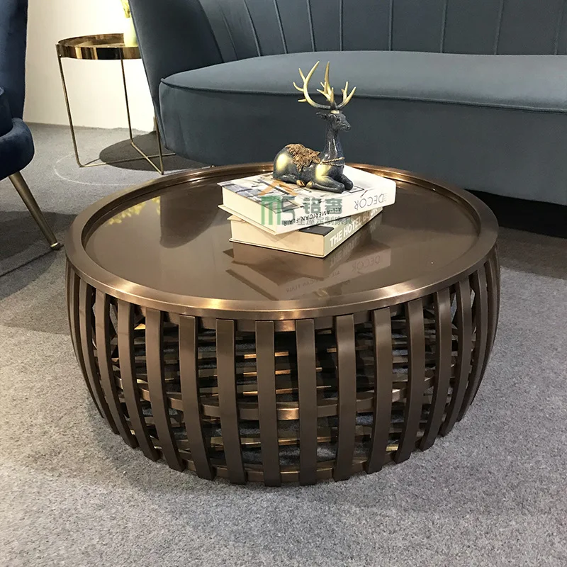 Modern minimalist living room round table stainless steel creative bronze low coffee table model room furniture
Modern minimalist living room round table stainless steel creative bronze low coffee table model room furniture