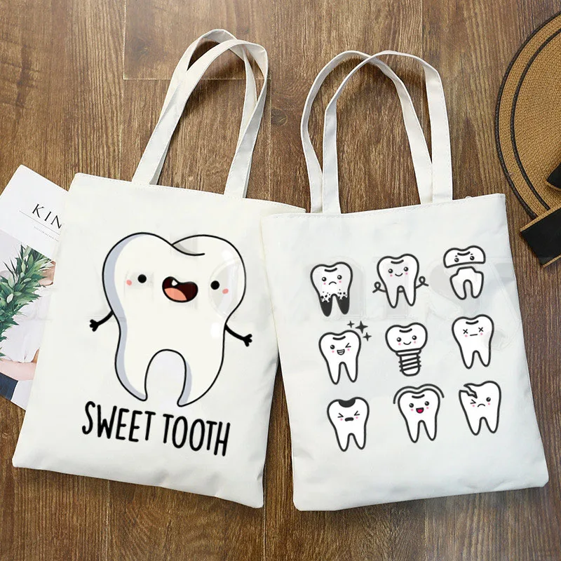 Tooth and Dentist Graphic Aesthetic Funny Fashion Handbags Shoulder Bags Casual Shopping Girls Handbag Women Elegant Canvas Bag
Tooth and Dentist Graphic Aesthetic Funny Fashion Handbags Shoulder Bags Casual Shopping Girls Handbag Women Elegant Canvas Bag