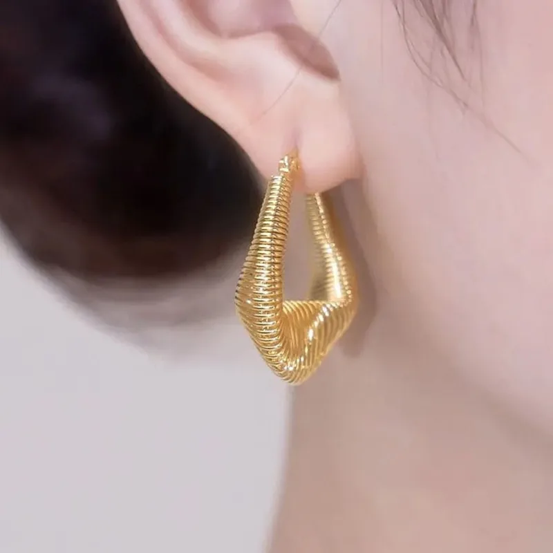 New Twisted Coil Golden Earring for Women Personality Stylish Simple Summer Daily Wear Accessories Party Jewelry Birthday Gift 
New Twisted Coil Golden Earring for Women Personality Stylish Simple Summer Daily Wear Accessories Party Jewelry Birthday Gift