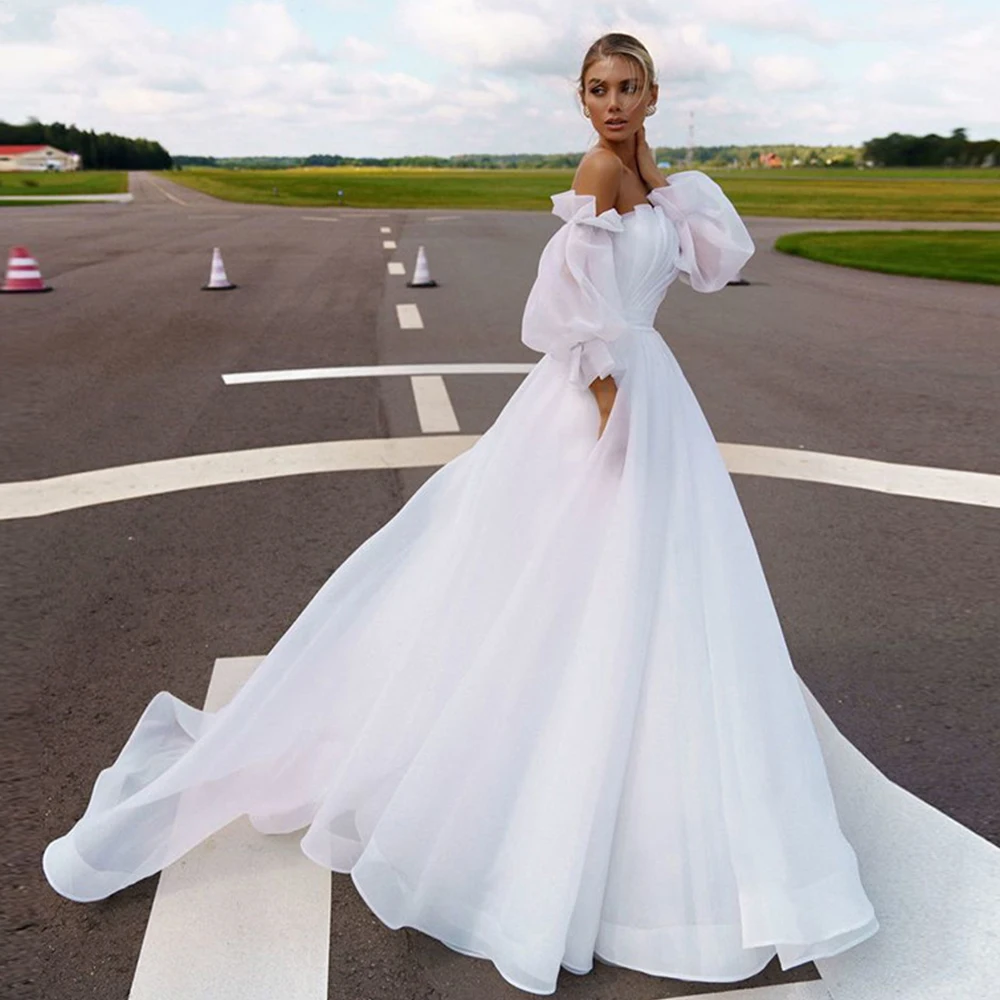 Princess Boho Wedding Dresses Strapless Puff Sleeves Organza Dress A-Line Ruffled Backless Ivory Bridal Gowns Vestidos de Novia
Princess Boho Wedding Dresses Strapless Puff Sleeves Organza Dress A-Line Ruffled Backless Ivory Bridal Gowns Vestidos de Novia