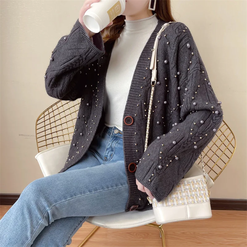 066 loose knitting wool coat v-neck joker 65 long sleeve cardigan sweater coat
066 loose knitting wool coat v-neck joker 65 long sleeve cardigan sweater coat