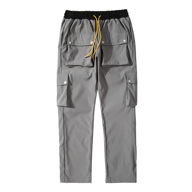 High Street Multi-pocket Casual Trousers for Men and Women Side Breasted Drawstring Cargo Pants Harajuku Solid Loose Pants
High Street Multi-pocket Casual Trousers for Men and Women Side Breasted Drawstring Cargo Pants Harajuku Solid Loose Pants