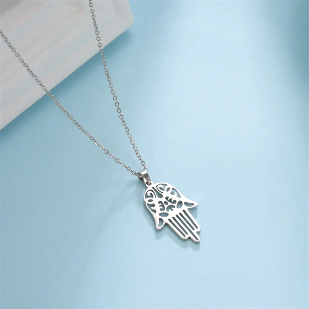 Jewish Arabic Hollow Hamesh Hand Pendant Necklace Women Men Amulet Stainless Steel Hand of Fatima Choker Islamic Jewelry Bijoux
Jewish Arabic Hollow Hamesh Hand Pendant Necklace Women Men Amulet Stainless Steel Hand of Fatima Choker Islamic Jewelry Bijoux