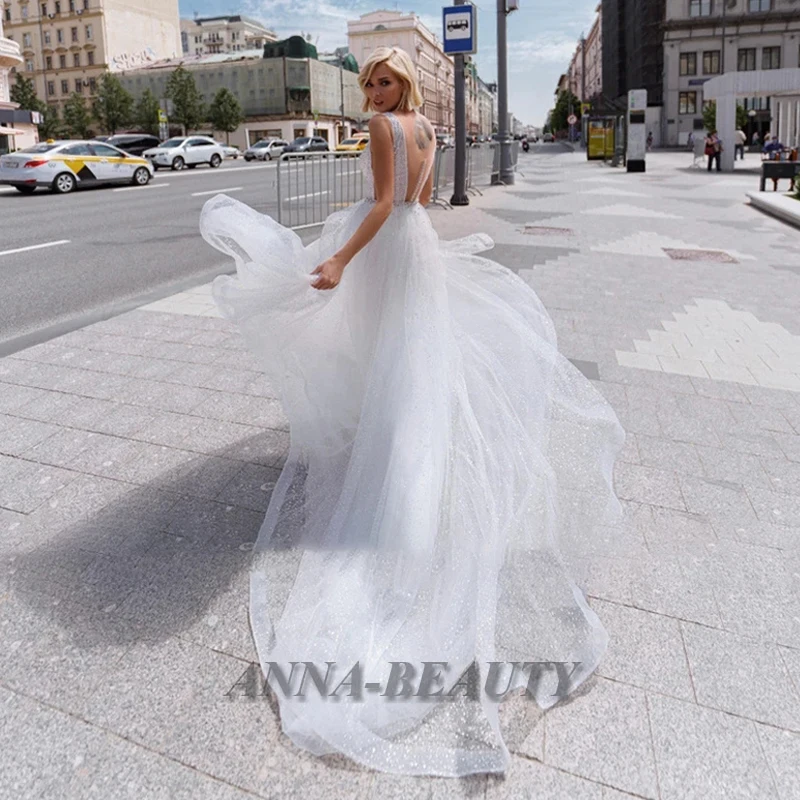 ANNA Elegant V Neck Wedding Dresses 2022 Sexy Glitter Tulle Crystal Sweep Train Sashes Robe De Mariee For Women Custom Made
ANNA Elegant V Neck Wedding Dresses 2022 Sexy Glitter Tulle Crystal Sweep Train Sashes Robe De Mariee For Women Custom Made