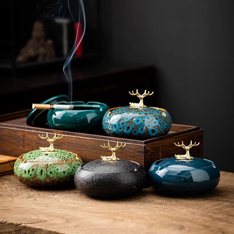 New Ceramic Ashtray Round with Lid Metal Handle with Gold Deer Lid Anti Fly Ash Cigar Ashtray Home Decoration Accessories
New Ceramic Ashtray Round with Lid Metal Handle with Gold Deer Lid Anti Fly Ash Cigar Ashtray Home Decoration Accessories