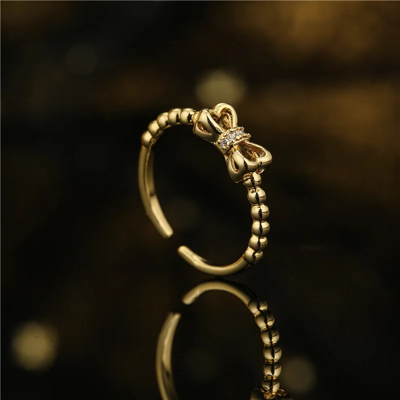 V&YIDOU Fashion minimalist bow opening ring for women Copper plating18KGold zircon ring R843
V&YIDOU Fashion minimalist bow opening ring for women Copper plating18KGold zircon ring R843