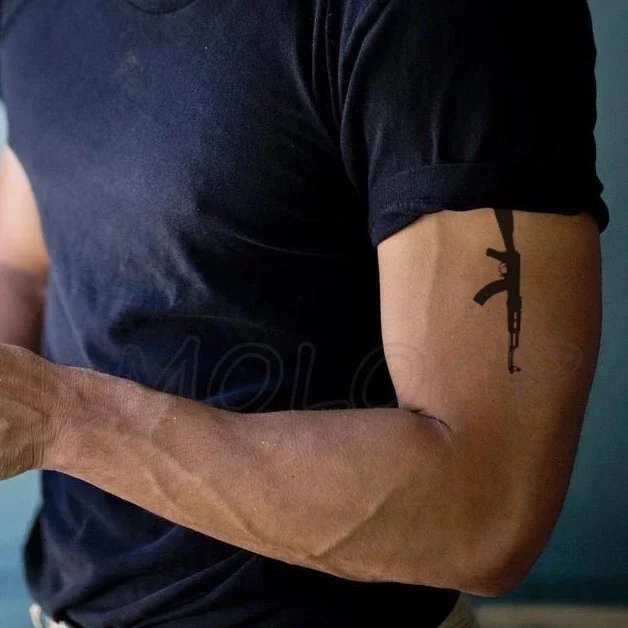 Tattoo Sticker Black gun pattern Temporary Water Transfer fake Tatoo Body Art Fashion Tatoo Girl Boy Arm hand small Tatto 
Tattoo Sticker Black gun pattern Temporary Water Transfer fake Tatoo Body Art Fashion Tatoo Girl Boy Arm hand small Tatto