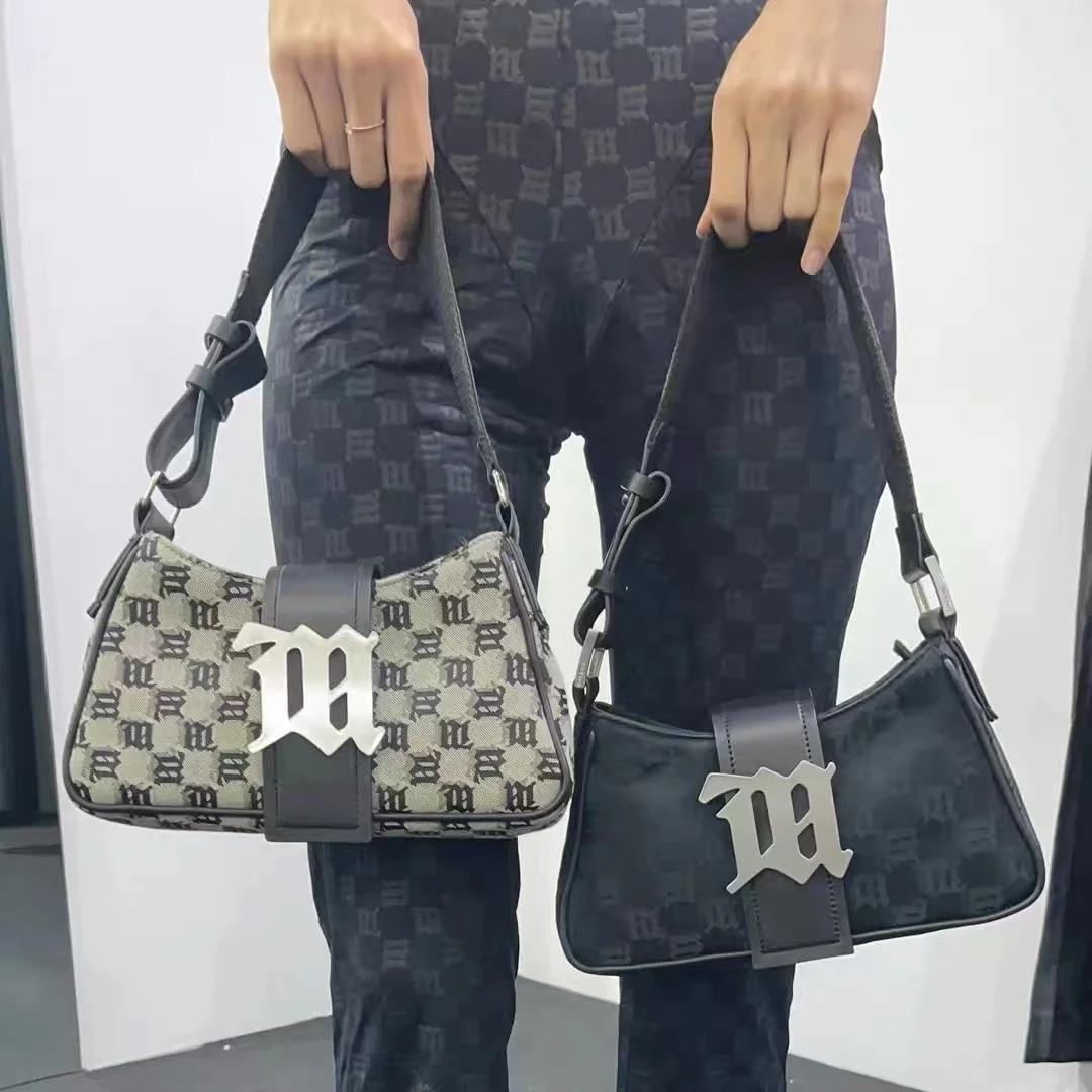 European and n Polish minority new product metal letter logo old plaid girl handbag single shouldder armpit bag millennium bag
European and n Polish minority new product metal letter logo old plaid girl handbag single shouldder armpit bag millennium bag