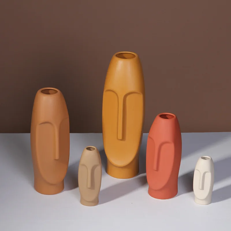 Morandi color style modern creative colorful human face ceramic vase ornaments home soft decoration living room room ornaments
Morandi color style modern creative colorful human face ceramic vase ornaments home soft decoration living room room ornaments