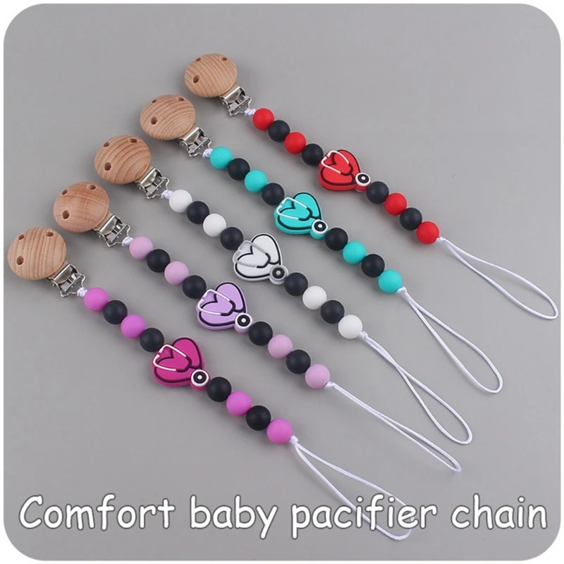 Зажим для соски для маленьких мальчиков и девочек, пищевой силиконовый держатель для соски с деревянным зажимом, дизайн зажима
Зажим для соски для маленьких мальчиков и девочек, пищевой силиконовый держатель для соски с деревянным зажимом, дизайн зажима