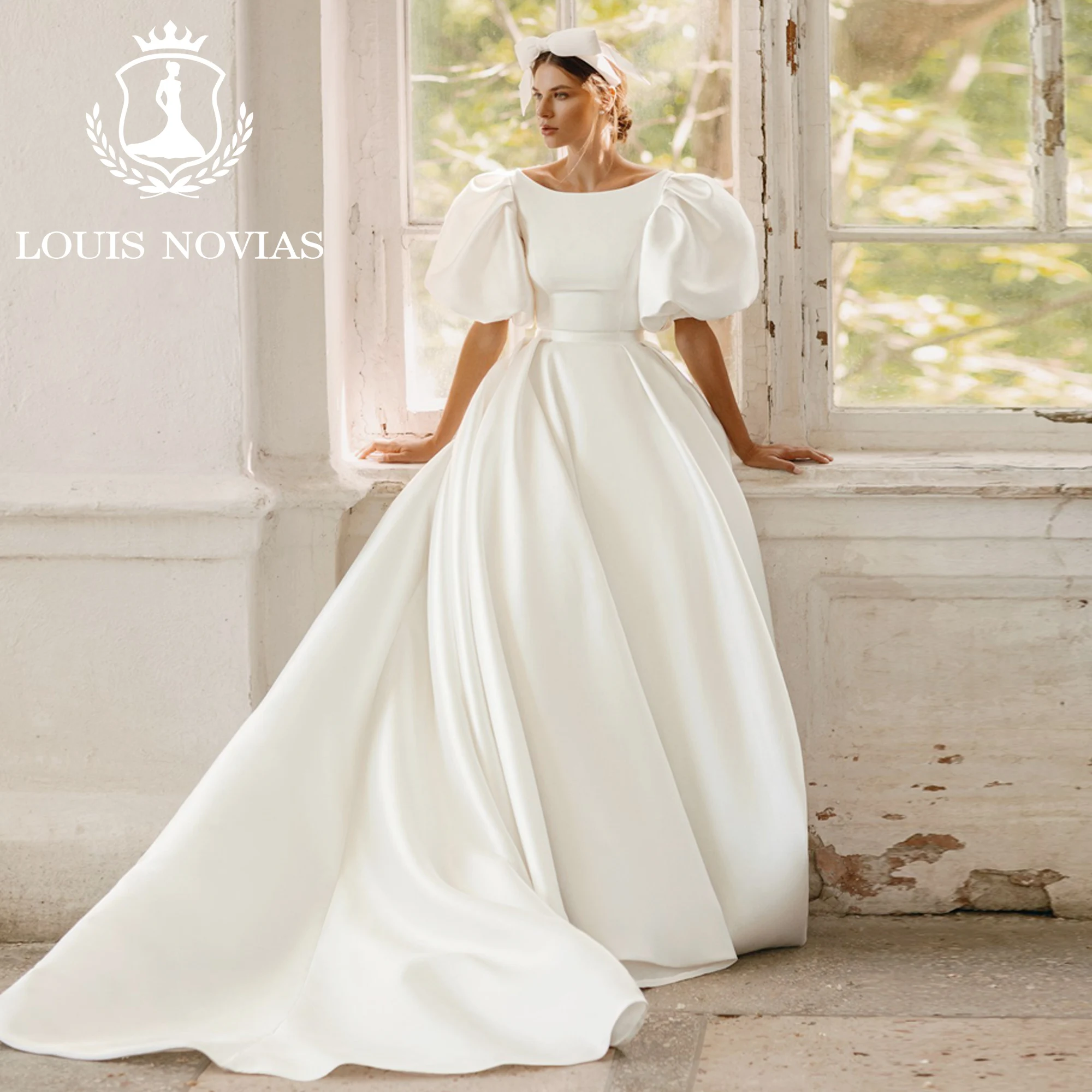 Женское атласное свадебное платье LOUIS NOVIAS, белое платье с глубоким круглым вырезом и пышными рукавами, со съемным шлейфом, лето 2023
Женское атласное свадебное платье LOUIS NOVIAS, белое платье с глубоким круглым вырезом и пышными рукавами, со съемным шлейфом, лето 2023