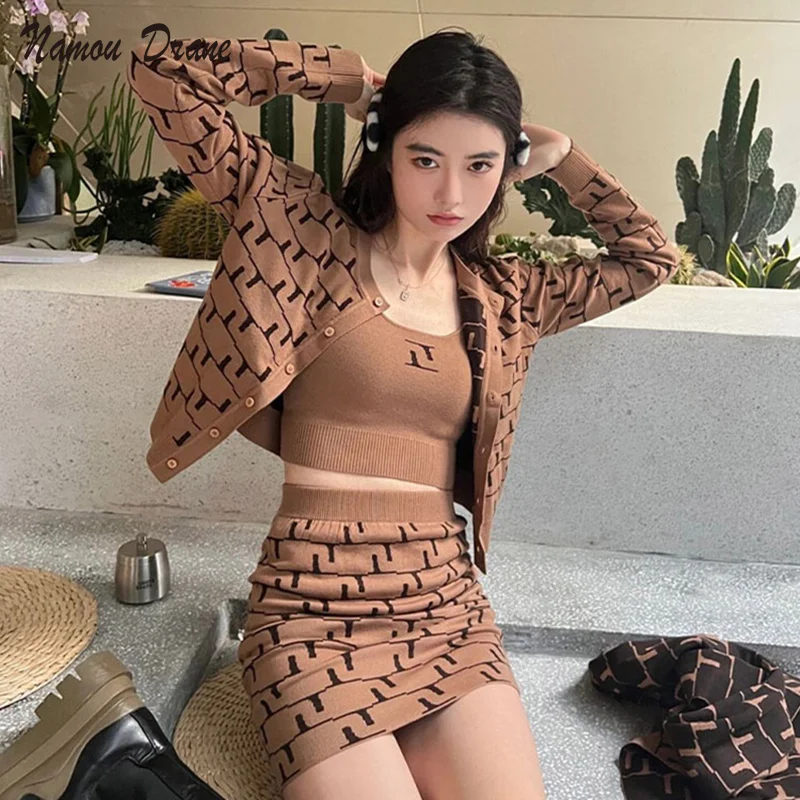 Namou Drane Knitted Cardigan Jacket Small Vest Three-piece Suit Skirt Women's Early Autumn Fashion New Package Hip Skirt Suit
Namou Drane Knitted Cardigan Jacket Small Vest Three-piece Suit Skirt Women's Early Autumn Fashion New Package Hip Skirt Suit
