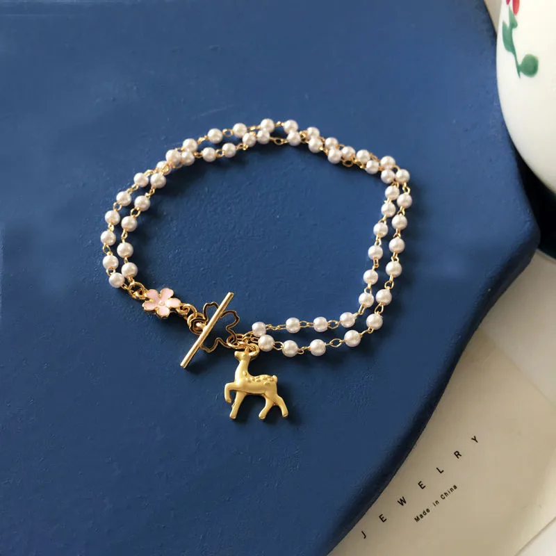 2022 New Cute Deer Bracelets Exquisite Daisy Flowers Pearl Bracelet Bangles Women Wedding Party Personality Jewelry Gift 
2022 New Cute Deer Bracelets Exquisite Daisy Flowers Pearl Bracelet Bangles Women Wedding Party Personality Jewelry Gift