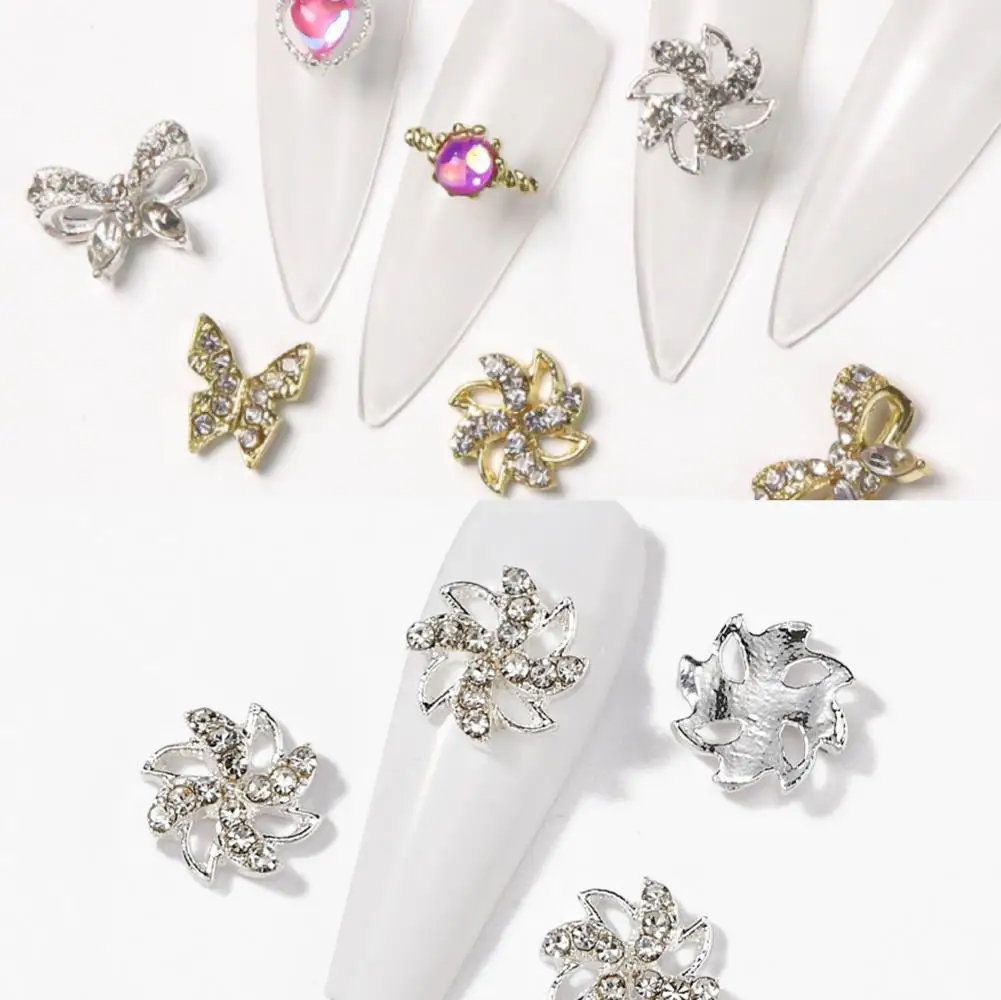 10pcs Gold Silver Multi-Designs Nail Art Jewelry Charms Crystal Rhinestones Alloy 3D Butterfly Pinwheel Shaped Nail Accessories 
10pcs Gold Silver Multi-Designs Nail Art Jewelry Charms Crystal Rhinestones Alloy 3D Butterfly Pinwheel Shaped Nail Accessories