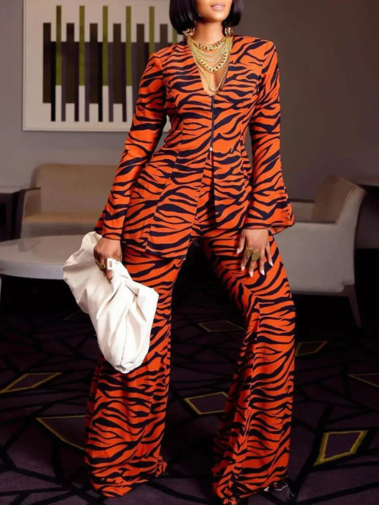 Women Printed Two Pieces Set Long Sleeve Zebra V Neck Zipper Up Wide Leg Pants Classy Vintage Suits African Spring 2023 Fashion
Women Printed Two Pieces Set Long Sleeve Zebra V Neck Zipper Up Wide Leg Pants Classy Vintage Suits African Spring 2023 Fashion