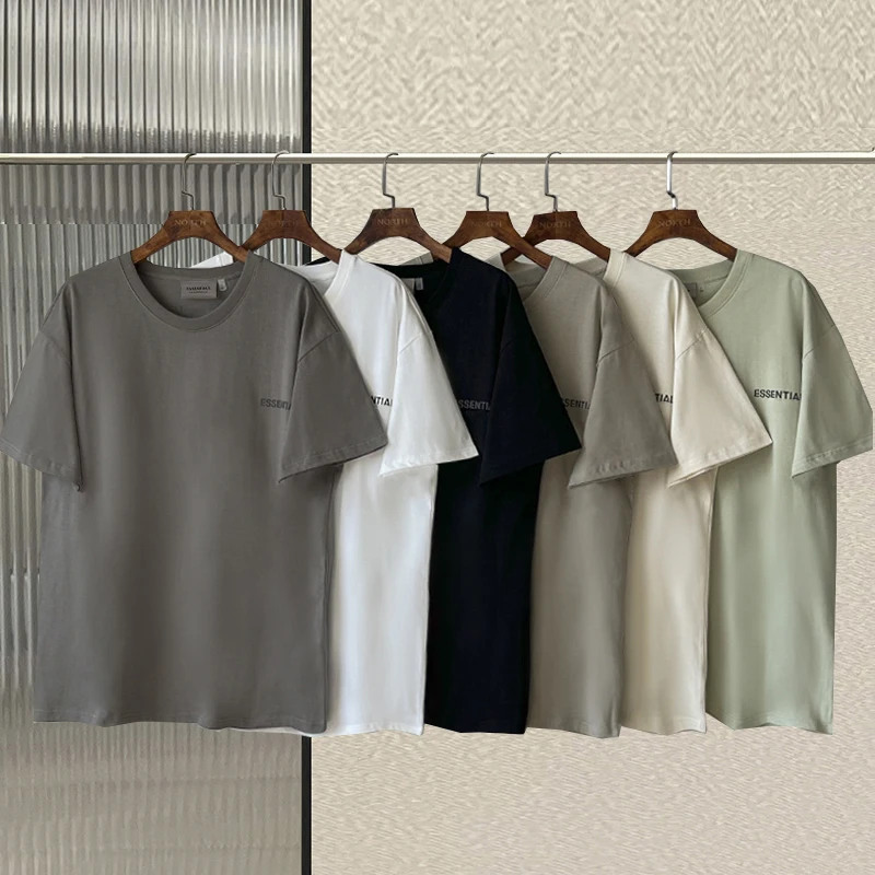 FW23 Новинка, летняя Базовая футболка, светоотражающие буквы, 100% хлопок, футболка оверсайз для мужчин и женщин, спортивные футболки в стиле хип-хоп
FW23 Новинка, летняя Базовая футболка, светоотражающие буквы, 100% хлопок, футболка оверсайз для мужчин и женщин, спортивные футболки в стиле хип-хоп