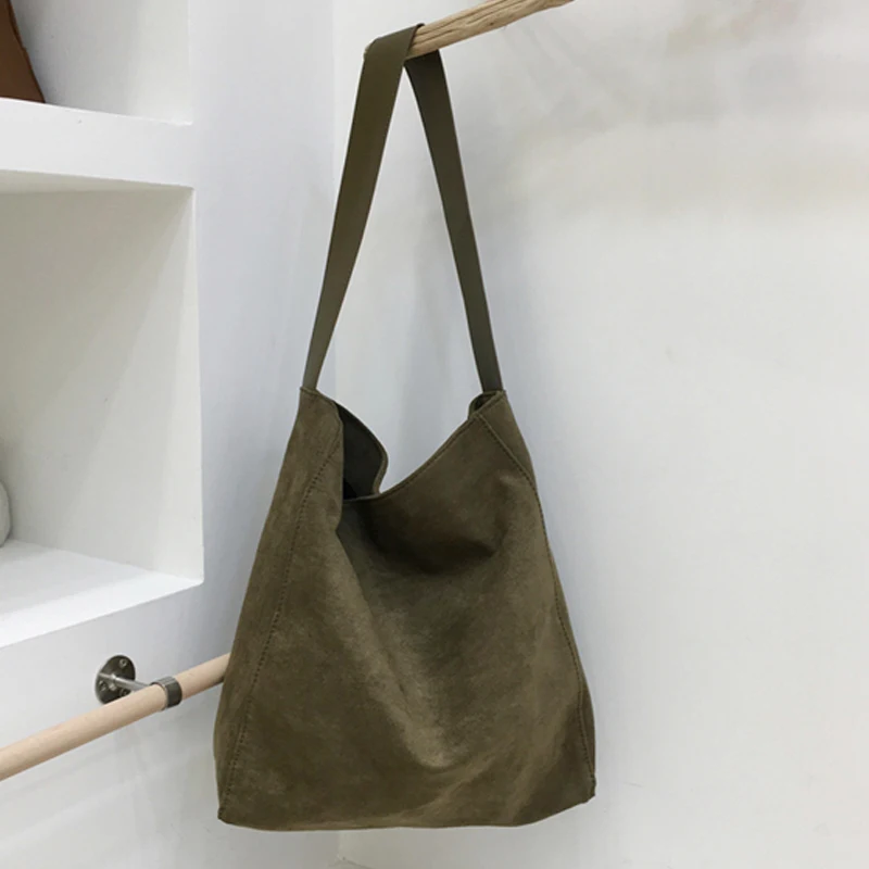 Сумка-мешок из искусственной замши для женщин, роскошные дизайнерские сумки и кошельки, новинка 2023, модные однотонные вместительные сумки на плечо
Сумка-мешок из искусственной замши для женщин, роскошные дизайнерские сумки и кошельки, новинка 2023, модные однотонные вместительные сумки на плечо