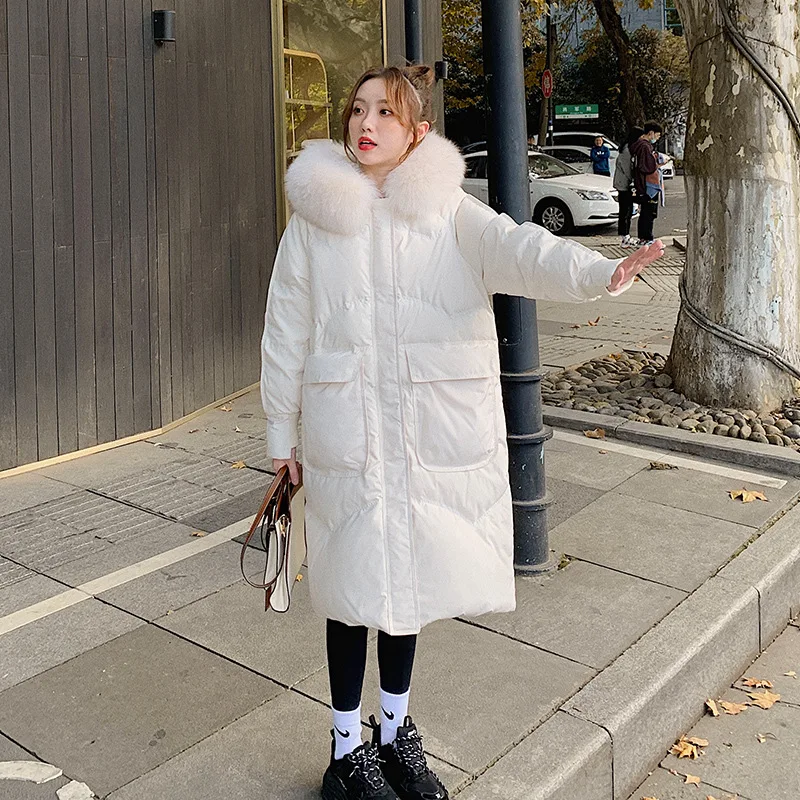 Shoulder loose sleeve 90 white duckling winter new loose thick adequate knee tap hat big fur collar down jacket female
Shoulder loose sleeve 90 white duckling winter new loose thick adequate knee tap hat big fur collar down jacket female